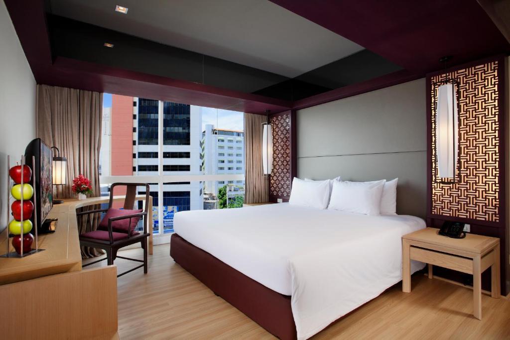 Habitación Doble Deluxe con cama extragrande y vistas a la ciudad